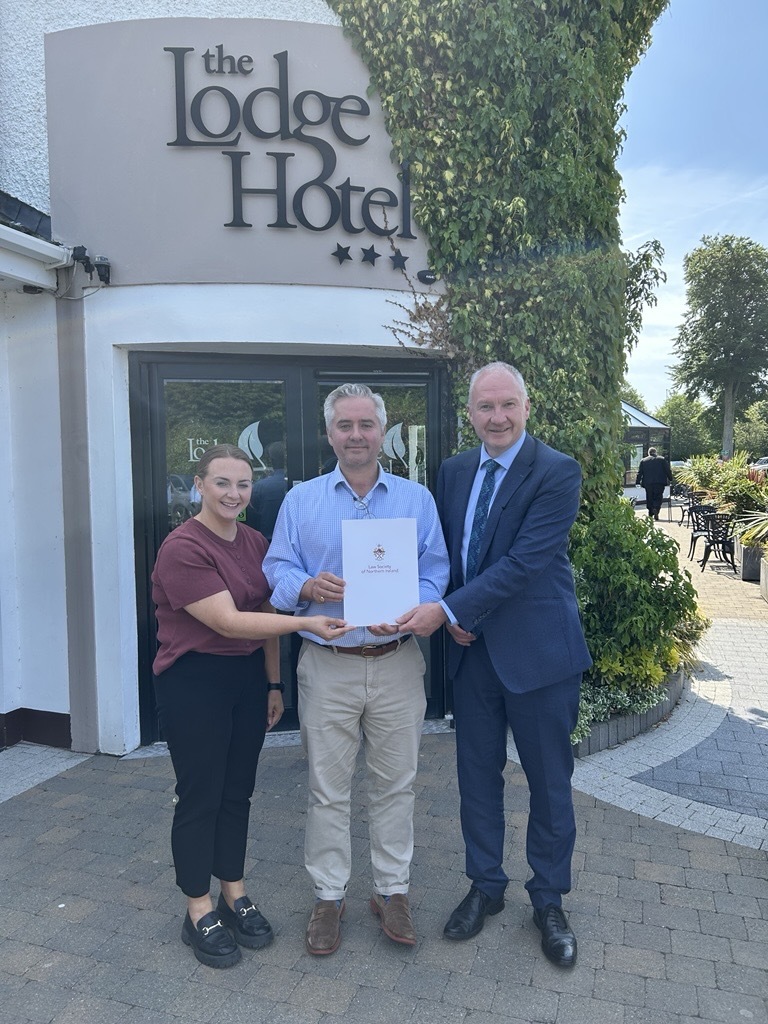 Secretary of Ballymoney and Coleraine Association Sinead Ingram LLB with Chair Christopher Clarke and Society President Mark Borland