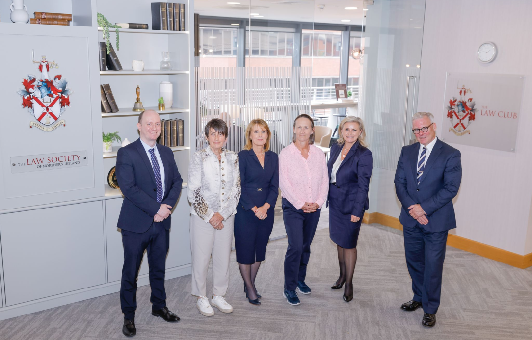 LSNI team members pose together in the office building