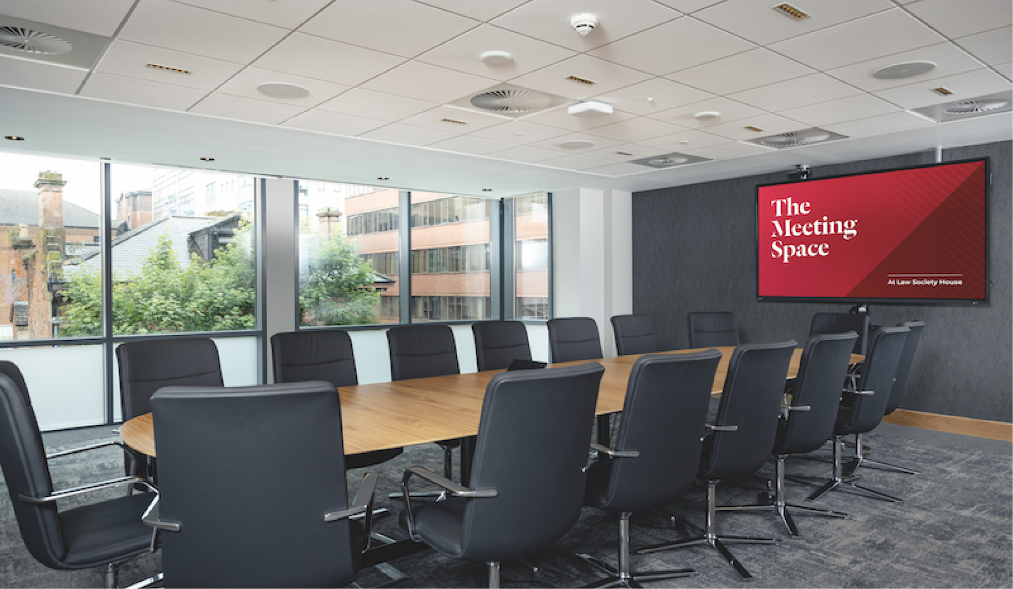 Law Society meeting space interior with boardroom table and chairs